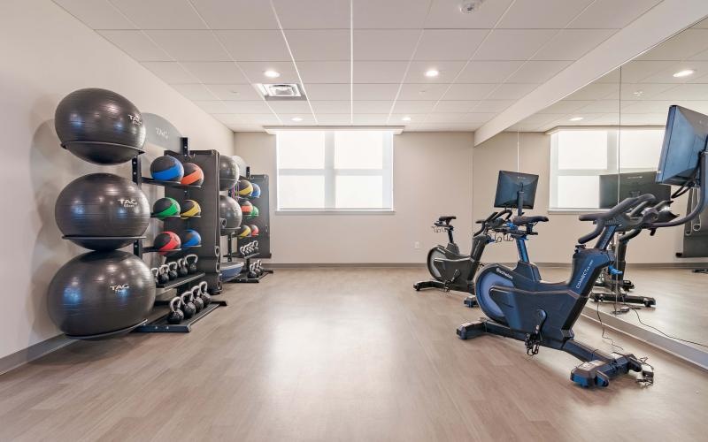 a yoga studio with wood floors